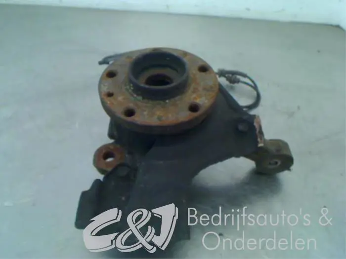 Knuckle, front left Opel Combo