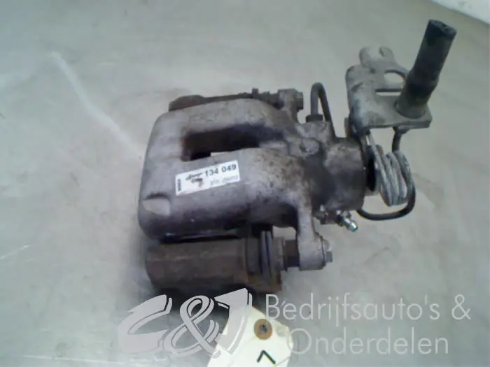 Rear brake calliper, left Volkswagen Caddy